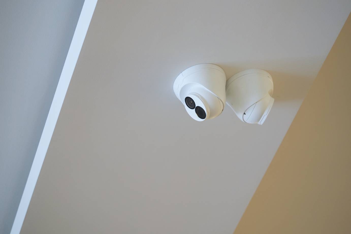 Dome security cameras mounted at ceiling height for commercial CCTV camera placement